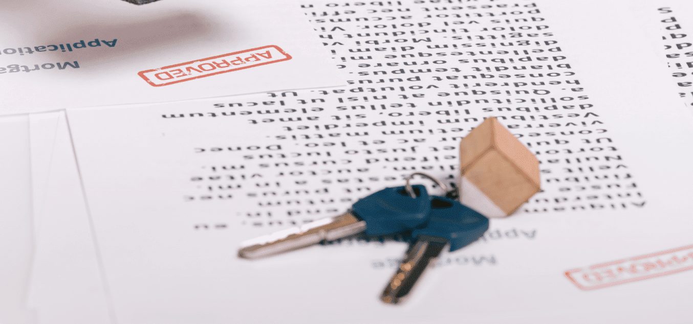 Keys on an approved mortgage application