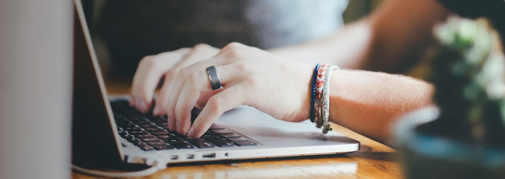 Mortgage Calculator hero image | hands typing on a laptop